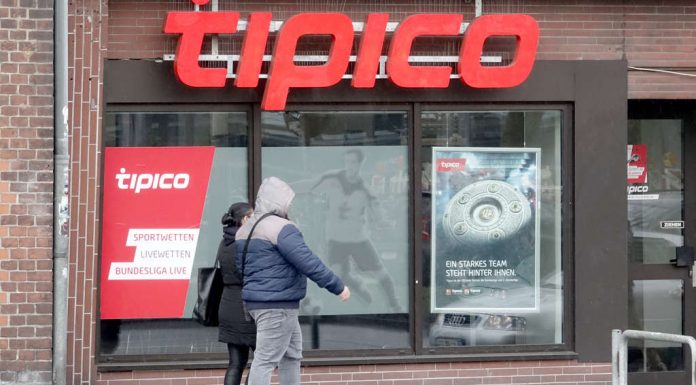 RAID on betting shop police are searching for an armed offender