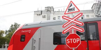 The car collided with a train in the suburbs