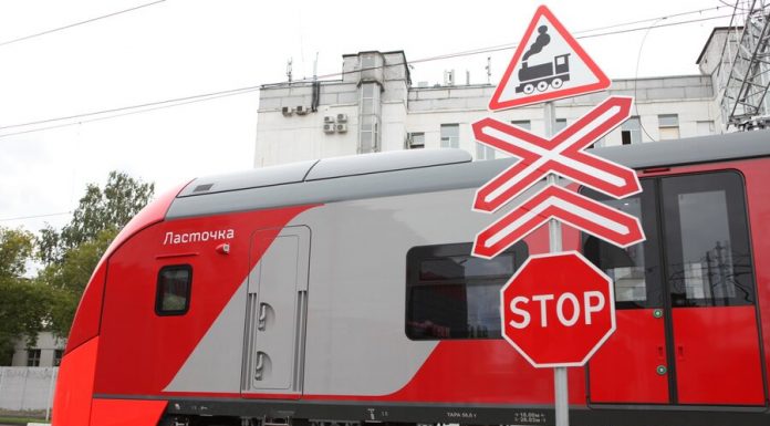 The car collided with a train in the suburbs