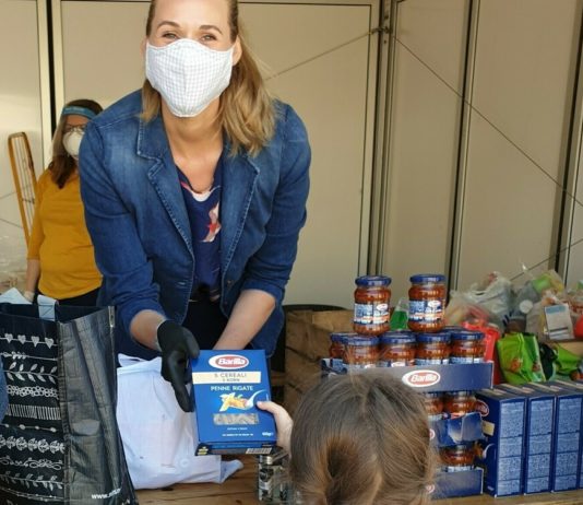 Actress Andrea Gerhard helps out at Hamburger Tafel