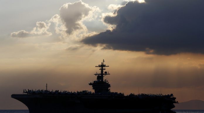 The Pentagon has denied the team infected a U.S. aircraft carrier in the evacuation