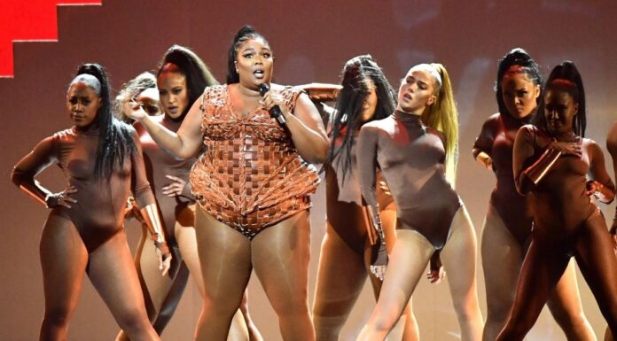 Lizzo shows plus-size curves in pankini