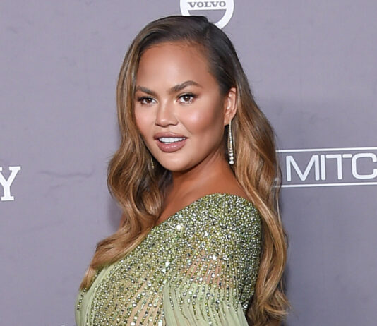 Chrissy Teigen is cheered up by her children after breast surgery